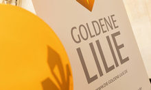 Die Goldene Lilie 2022 - PLakat für 2022 in Gelb, Gold und Weiß