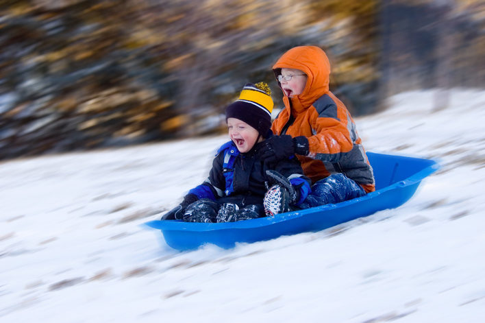 Children enjoying the snowy weather.