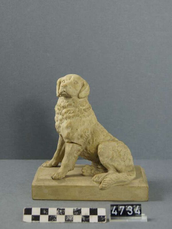 Статуетка собаки сенбернара з жовтої глини