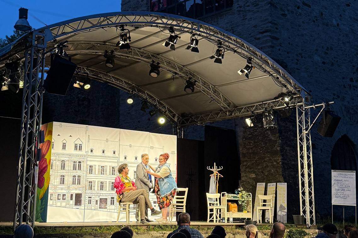 Actors and actresses on an open-air stage
