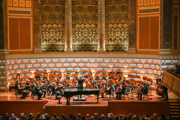 Orchestra with conductor