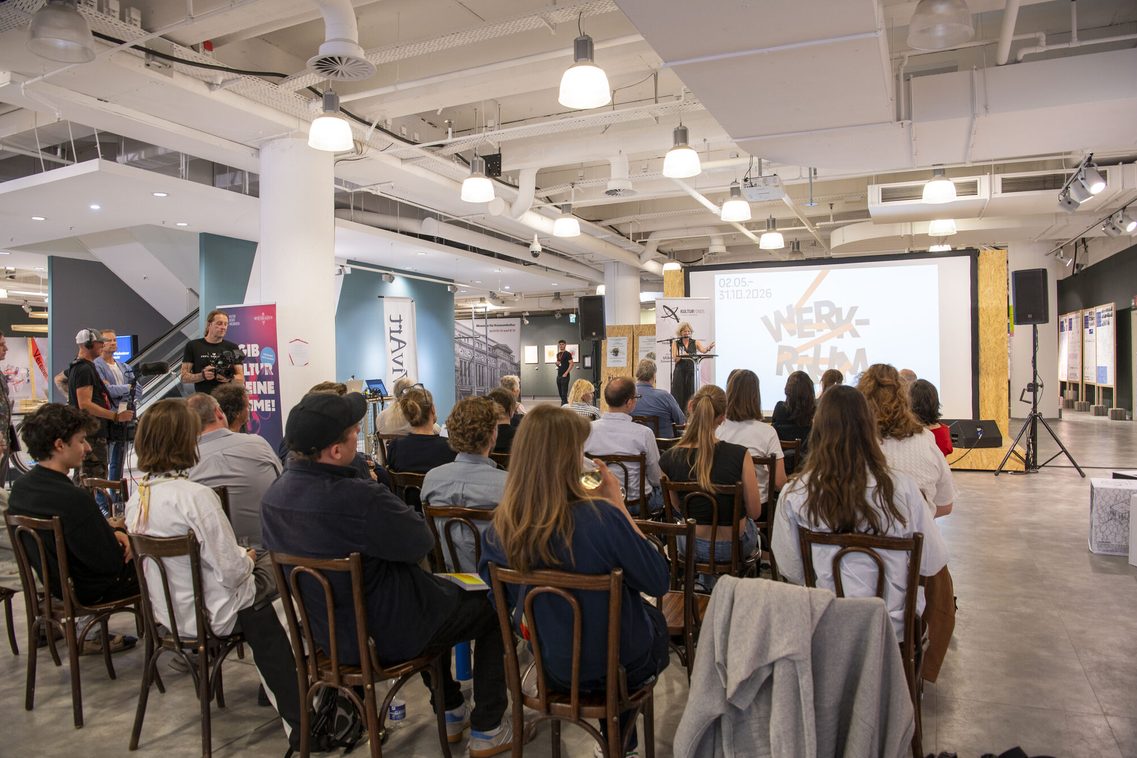 A photo of people attending a lecture at WerkRaum.