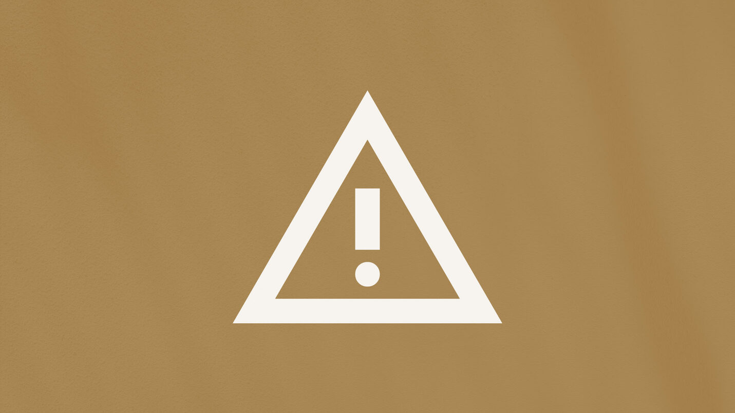 Das Foto zeigt ein Warnsymbol.