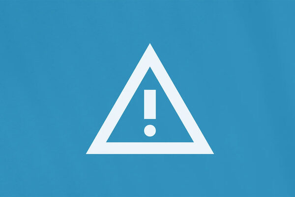 Das Foto zeigt ein Warnsymbol.