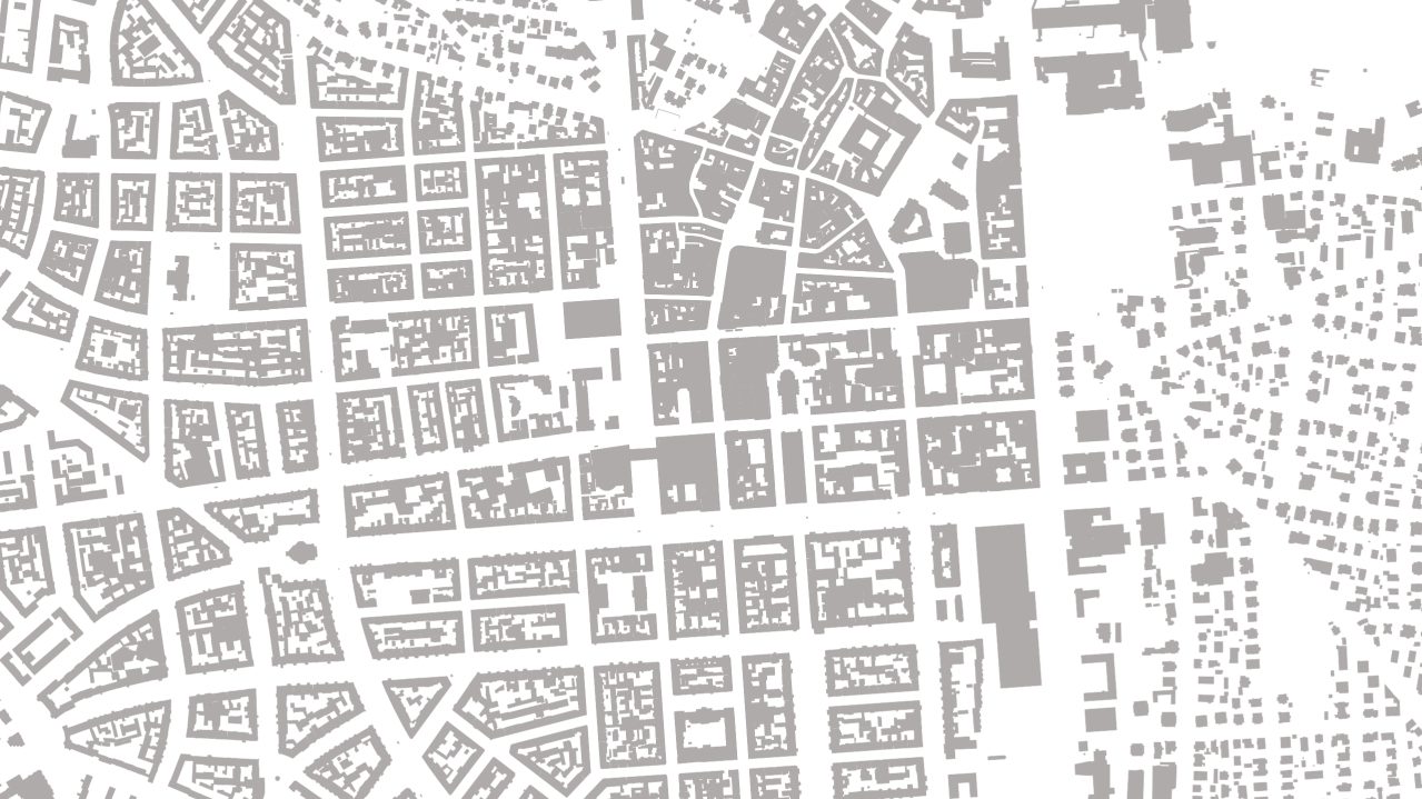 Das Bild zeigt eine kartografische Darstellung (Schwarzplan) von Wiesbaden. Es enthält verschiedene graue und weiße Bereiche, Linien und Polygone, die verschiedene geographische oder infrastrukturelle Elemente darstellen. Straßen, Gebäude, Grünflächen oder Wasserflächen sind erkennbar.