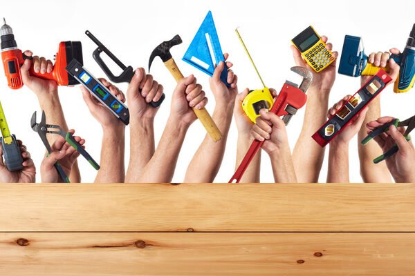 Hands with DIY tools.