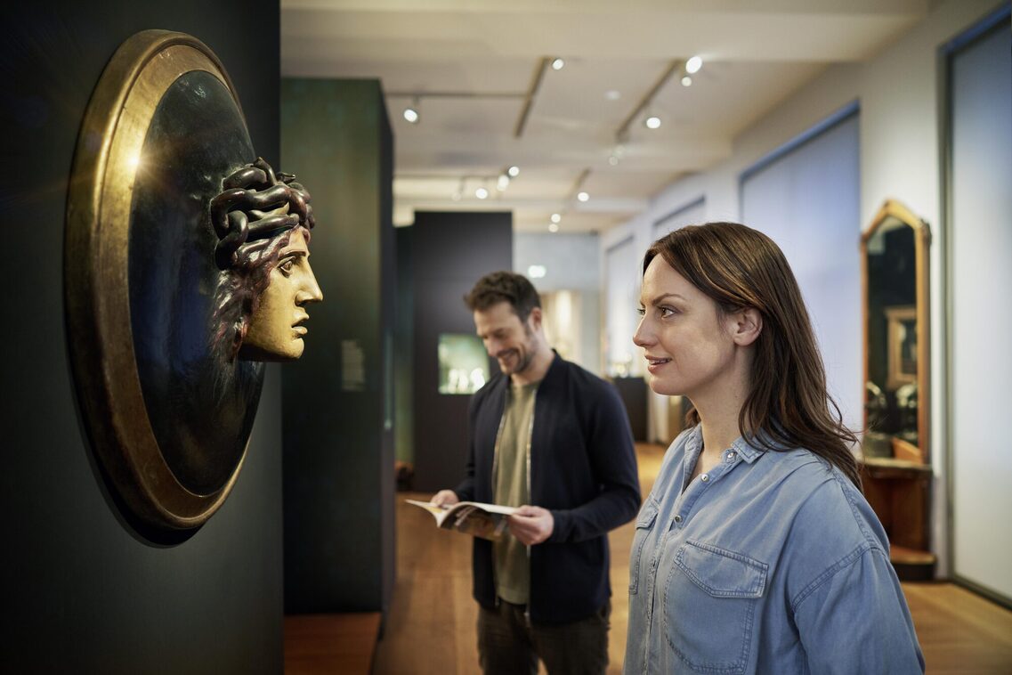 Woman opposite Art Nouveau bust