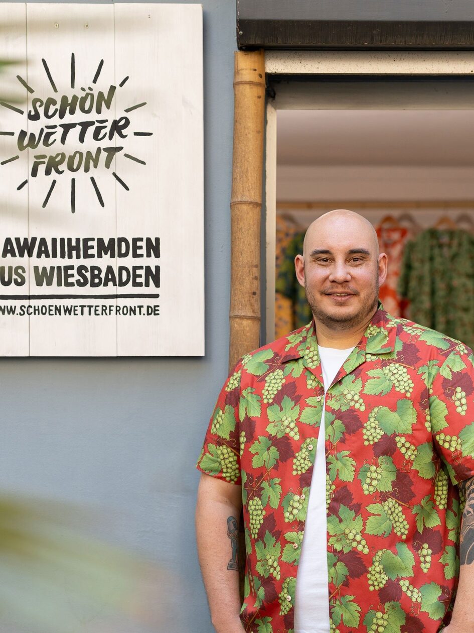 Christian from Schönwetterfront in front of his store