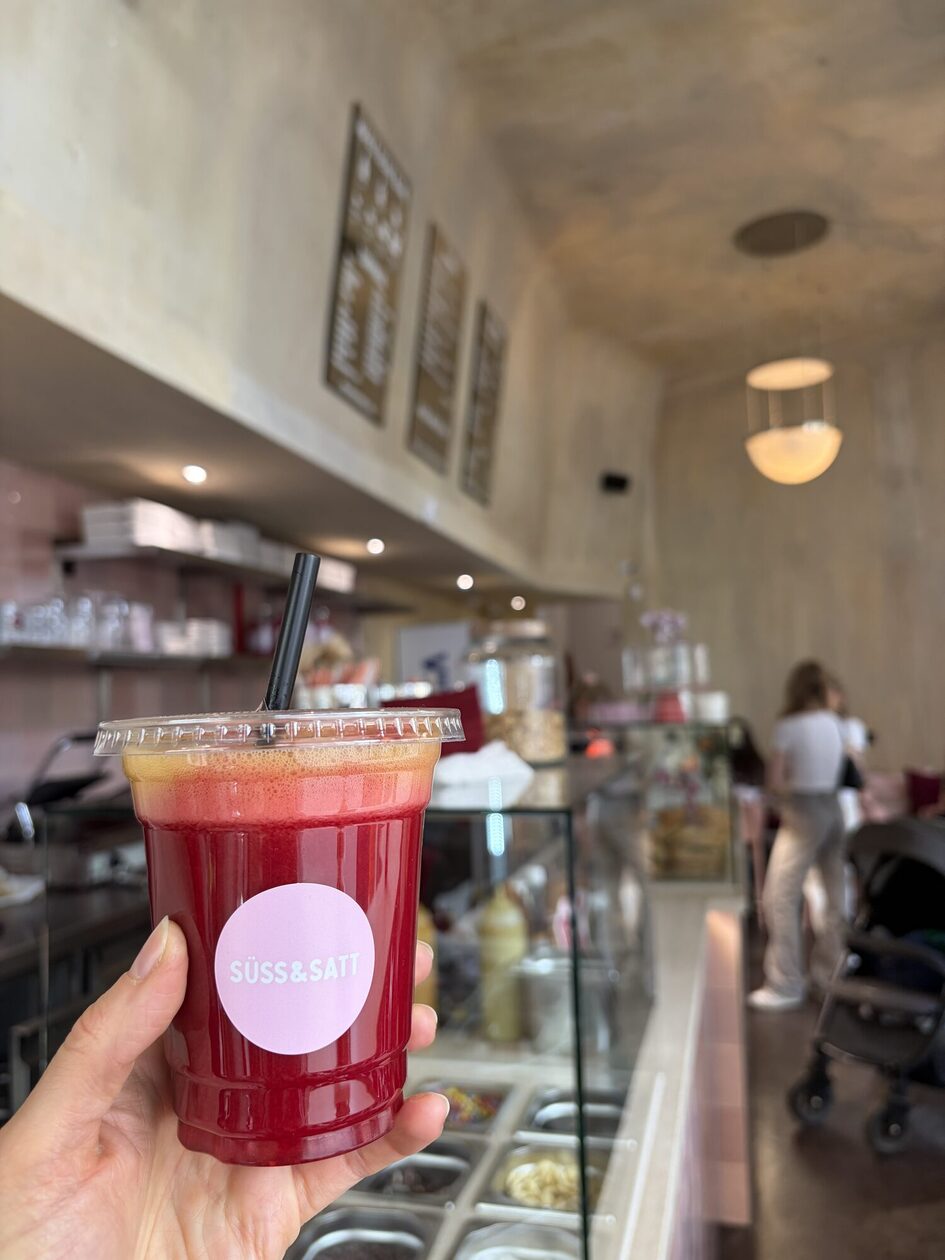 Hand holding a smoothie