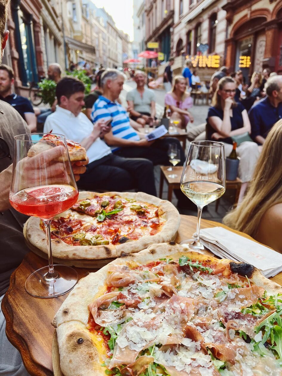 Pizza and wine in the alley