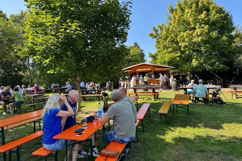 Wine tasting stand under trees
