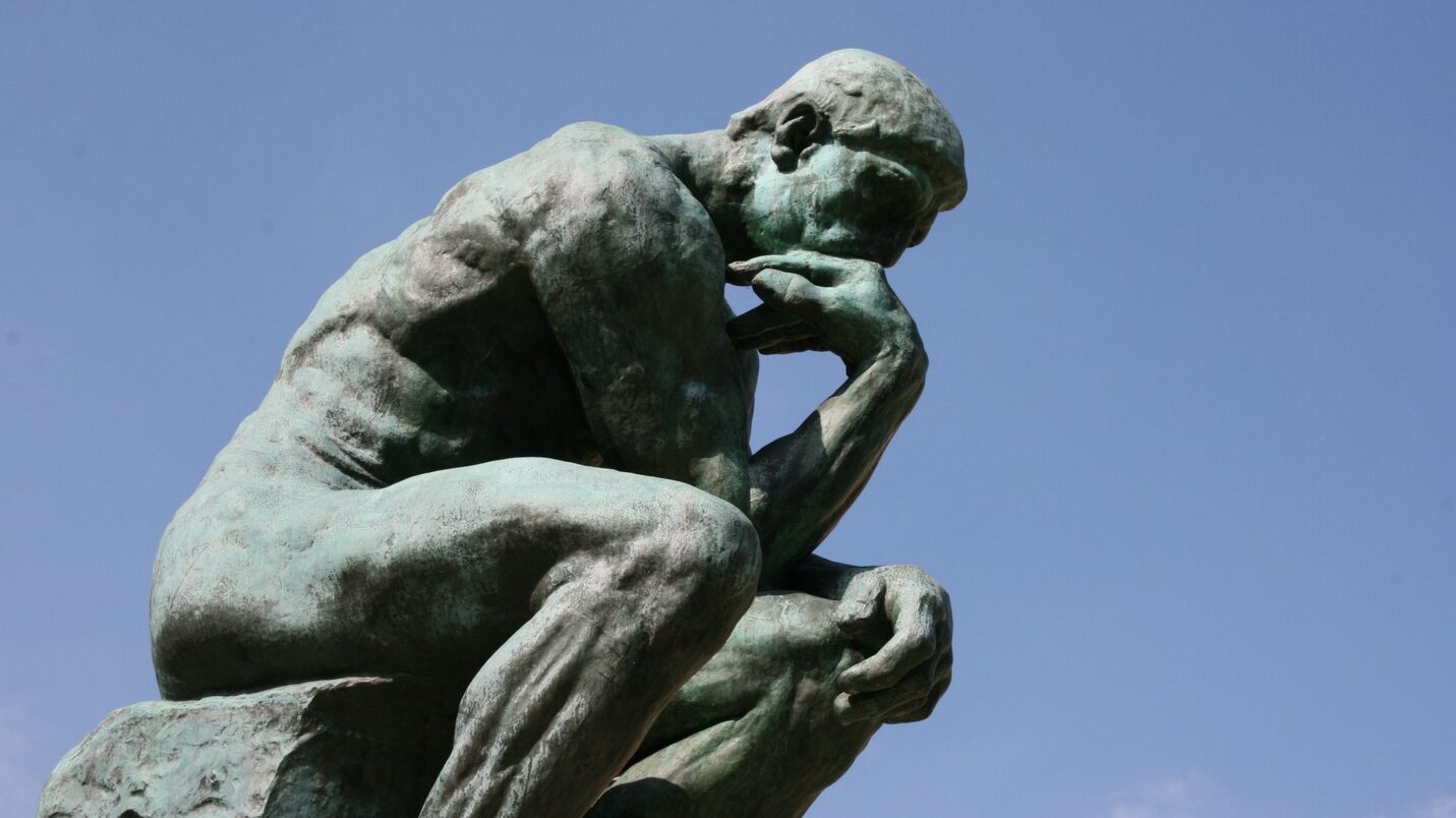 Sculpture in thinker pose