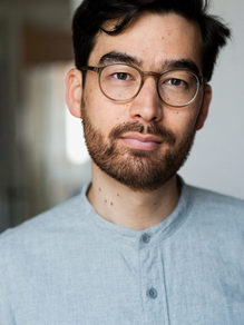 Porträt Yannic Han Biao Federer, junger Mann mit Brille, asiatische Züge