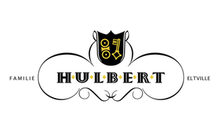 Weingut Hulbert - Logo mit Namen in schwarz/gelb im Vordergrund.