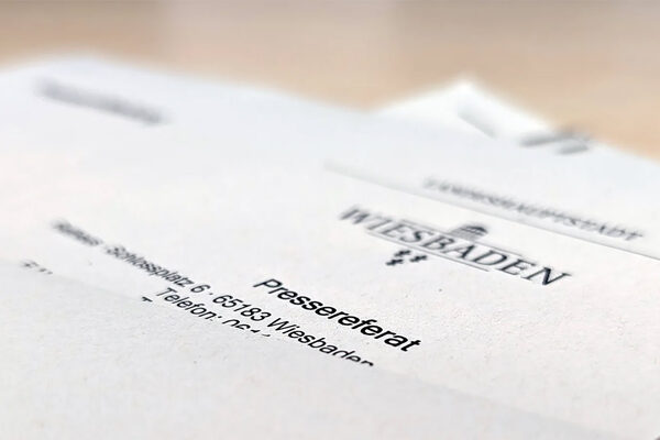 Das Foto zeigt das Wort Pressereferat auf einer Pressemitteilung.